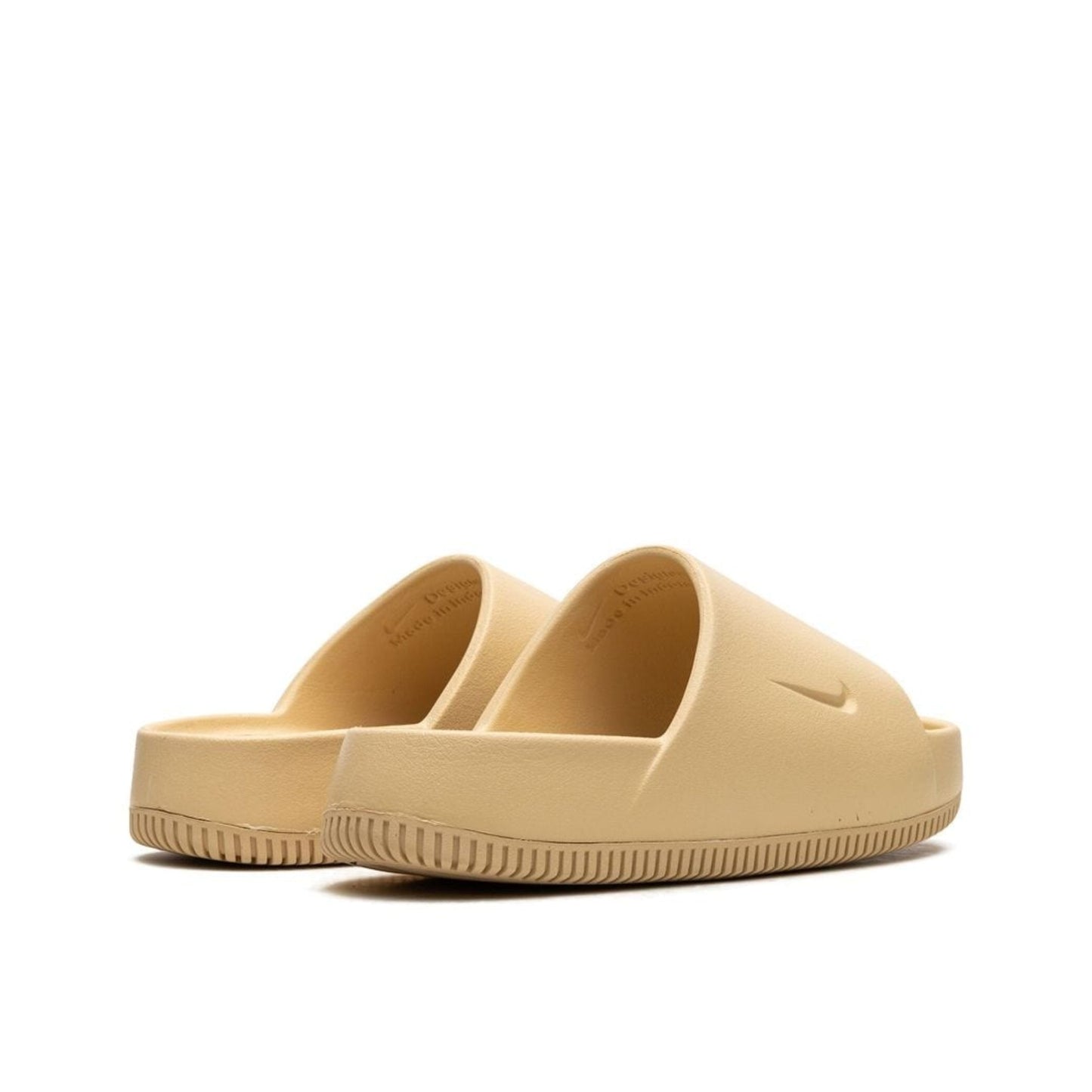 Nike
Calm "Sesame" slides